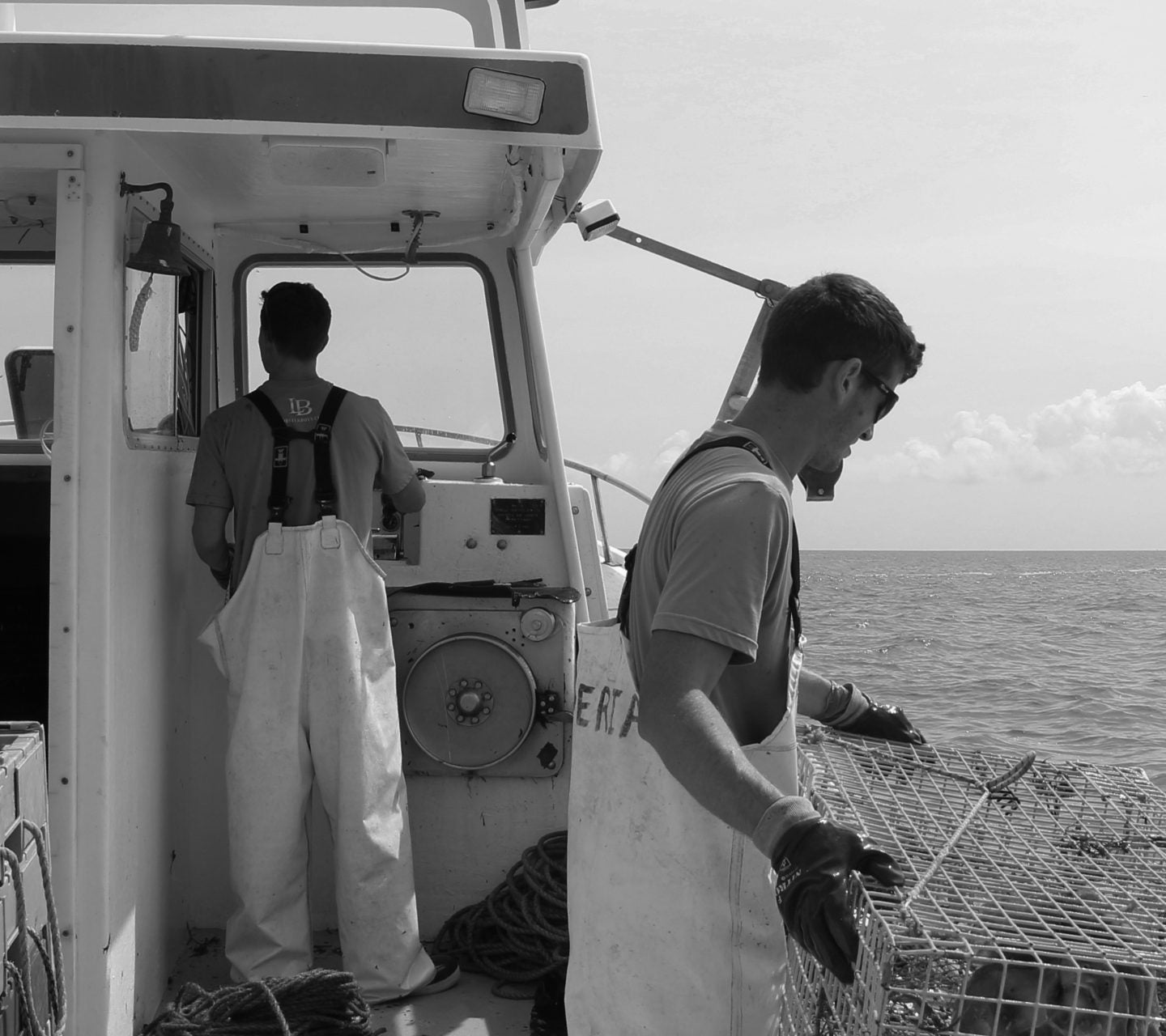Lobstermen working aboard a fishing boat